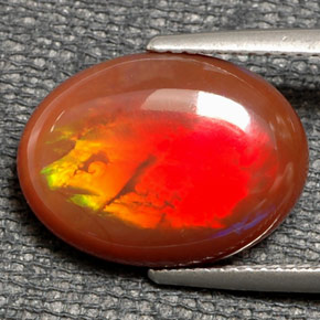 Ópalo de fuego multicolor natural de 6,21 ct, corte óvalo, translúcido