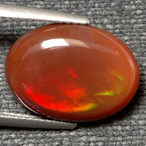 Ópalo de fuego multicolor natural de 6,21 ct, corte óvalo, translúcido