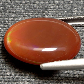 Ópalo de fuego multicolor natural de 6,21 ct, corte óvalo, translúcido