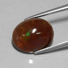 Ópalo de fuego multicolor natural de 6,48 ct, corte óvalo, opaco