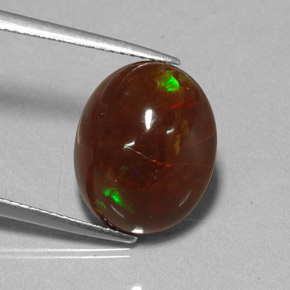 Ópalo de fuego multicolor natural de 6,48 ct, corte óvalo, opaco