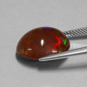 Ópalo de fuego multicolor natural de 6,48 ct, corte óvalo, opaco