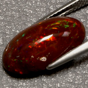 Ópalo de fuego multicolor natural de 5,06 ct, corte óvalo, opaco