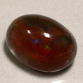 Ópalo de fuego multicolor natural de 10,39 ct, corte óvalo, opaco