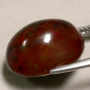 Ópalo de fuego multicolor natural de 10,39 ct, corte óvalo, opaco