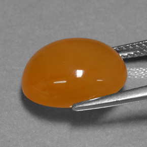 Ópalo de fuego Naranja natural de 6.07 ct, Corte Óvalo, Translúcido