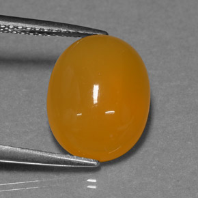 Ópalo de fuego naranja natural de 3,93 ct, corte óvalo, translúcido