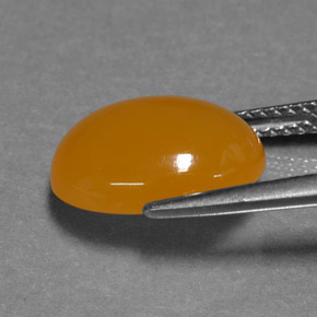Ópalo de fuego naranja natural de 3,93 ct, corte óvalo, translúcido