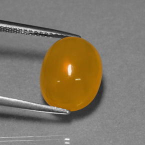 Ópalo de fuego naranja natural de 4,76 ct, corte óvalo, translúcido
