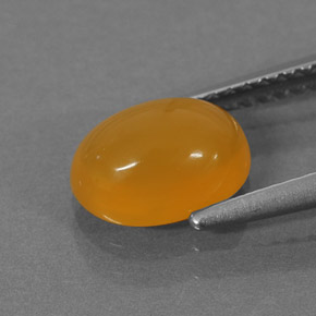 Ópalo de fuego naranja natural de 1,30 ct, corte óvalo, translúcido