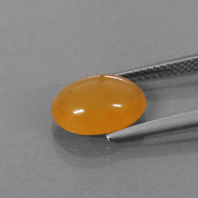 Ópalo de fuego naranja natural de 2,58 ct, corte óvalo, translúcido