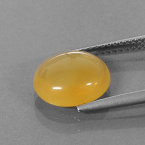Ópalo de fuego naranja natural de 2,42 ct, corte óvalo, translúcido