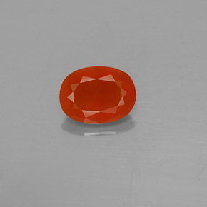 Ópalo de fuego Naranja rojizo natural de 0.89 ct, Corte Óvalo, Transparente