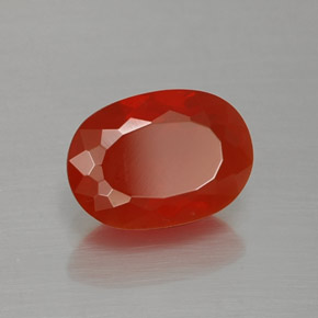 Ópalo de fuego Naranja rojizo natural de 1.13 ct, Corte Óvalo, Transparente