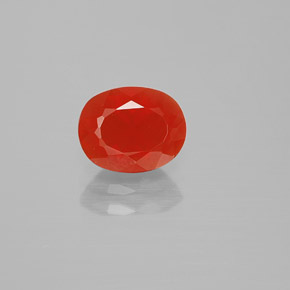 Ópalo de fuego naranja natural de 1,10 ct, corte óvalo, transparente