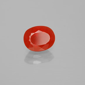 Ópalo de fuego naranja natural de 1,10 ct, corte óvalo, transparente