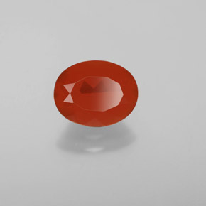 Ópalo de fuego Naranja natural de 1.29 ct, Corte Óvalo, Transparente