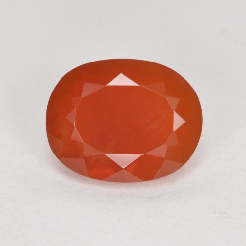 Ópalo de fuego Roja Anaranjada natural de 1.32 ct, Corte Óvalo, Transparente