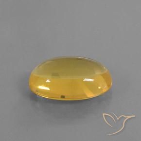 Ópalo de fuego Naranja dorado natural de 15.79 ct, Ovalada, Transparente