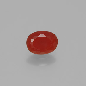 Ópalo de fuego naranja natural de 0,49 ct, corte óvalo, transparente