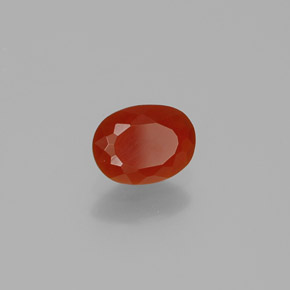 Ópalo de fuego naranja natural de 0,49 ct, corte óvalo, transparente