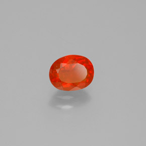 Ópalo de fuego Naranja rojizo natural de 0.62 ct, Corte Óvalo, Transparente