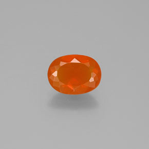 Ópalo de fuego naranja natural de 0,75 ct, corte óvalo, transparente