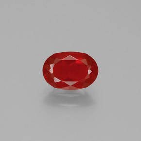 Ópalo de fuego naranja natural de 0,89 ct, corte óvalo, transparente