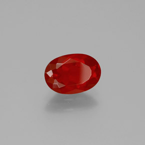 Ópalo de fuego naranja natural de 0,89 ct, corte óvalo, transparente