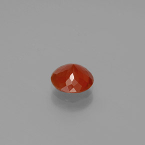 Ópalo de fuego Naranja rojizo natural de 0.70 ct, Corte Redondo, Transparente