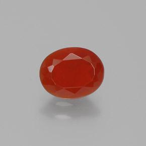 Ópalo de fuego rojo natural de 0,64 ct, corte óvalo, transparente