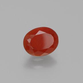 Ópalo de fuego rojo natural de 0,64 ct, corte óvalo, transparente