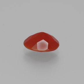 Ópalo de fuego rojo natural de 0,64 ct, corte óvalo, transparente