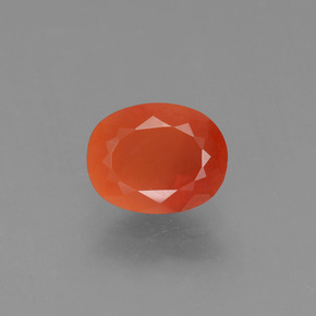Ópalo de fuego Naranja rojizo natural de 0.96 ct, Corte Óvalo, Transparente