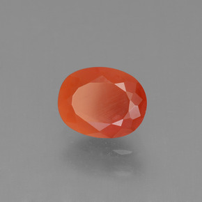 Ópalo de fuego Naranja rojizo natural de 0.96 ct, Corte Óvalo, Transparente