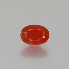 Ópalo de fuego Naranja rojizo natural de 0.54 ct, Corte Óvalo, Transparente
