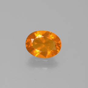 Ópalo de fuego Naranja natural de 0.77 ct, Corte Óvalo, Transparente