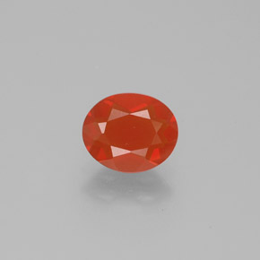 Ópalo de fuego naranja natural de 0,74 ct, corte óvalo, transparente