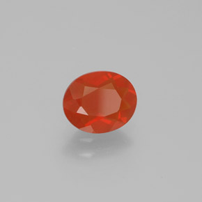 Ópalo de fuego naranja natural de 0,74 ct, corte óvalo, transparente