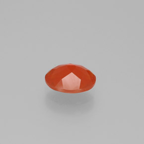 Ópalo de fuego naranja natural de 0,74 ct, corte óvalo, transparente