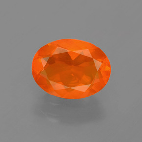 Ópalo de fuego Naranja natural de 0.93 ct, Corte Óvalo, Transparente