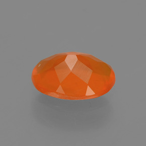 Ópalo de fuego naranja natural de 1,04 ct, corte óvalo, transparente