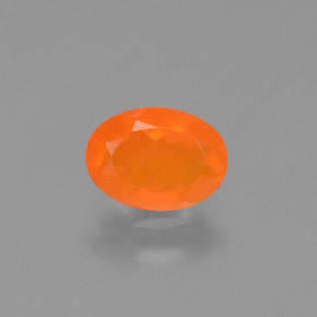 Ópalo de fuego naranja natural de 0,48 ct, corte óvalo, transparente