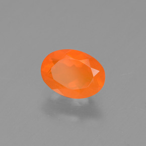 Ópalo de fuego naranja natural de 0,48 ct, corte óvalo, transparente