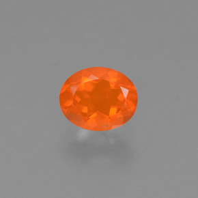 Ópalo de fuego Naranja natural de 0.43 ct, Corte Óvalo, Transparente
