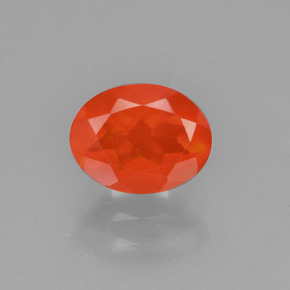 Ópalo de fuego Naranja natural de 0.71 ct, Corte Óvalo, Transparente