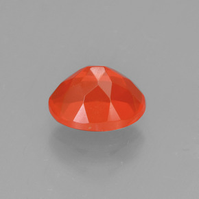 Ópalo de fuego Naranja natural de 0.71 ct, Corte Óvalo, Transparente