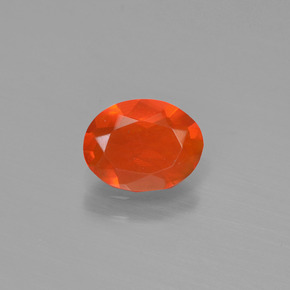 Ópalo de fuego Naranja natural de 0.45 ct, Corte Óvalo, Transparente