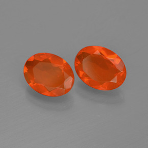 Gemas de ópalo de fuego rojo natural de 1,29 ct, corte óvalo, transparente