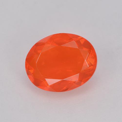 Ópalo de fuego Naranja intenso natural de 0.83 ct, Corte Óvalo, Transparente